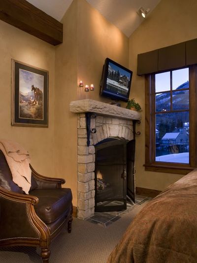 a fireplace in a hotel room